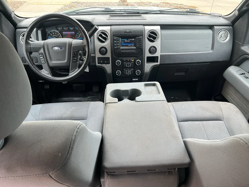 Used 2013 Ford F-150 XLT with VIN 1FTFW1EF0DKE50592 for sale in Pella, IA