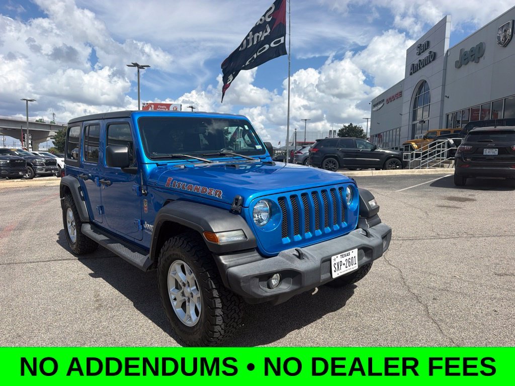 Used 2021 Blue Jeep Unlimited Sport image 1