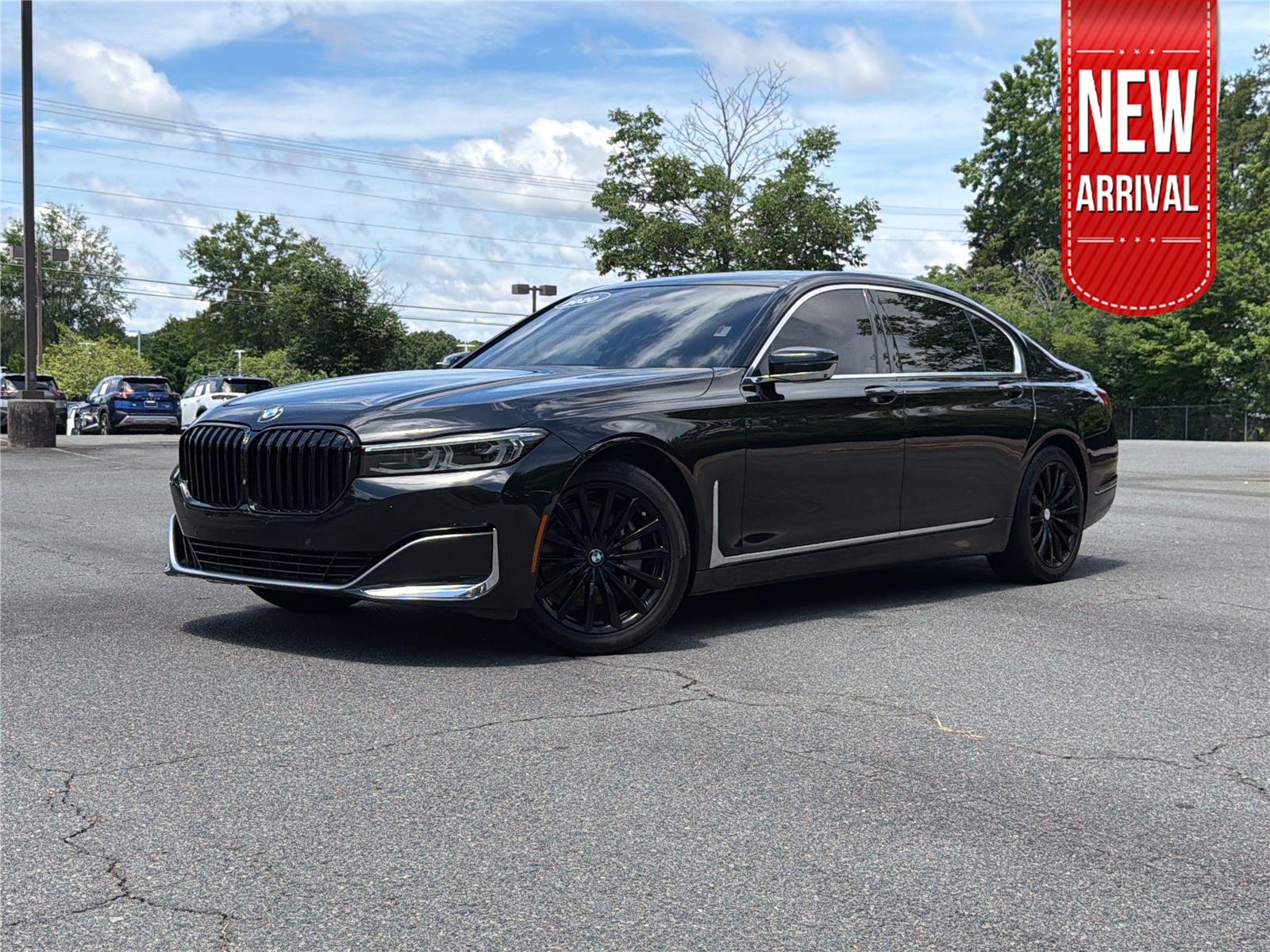 Used 2020 Black Sapphire Metallic BMW 740i xDrive image 1