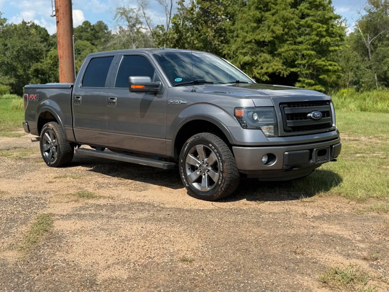 Used 2013 Gray Ford FX4 4x4 4dr SuperCrew Styleside 5.5 ft. SB image 7