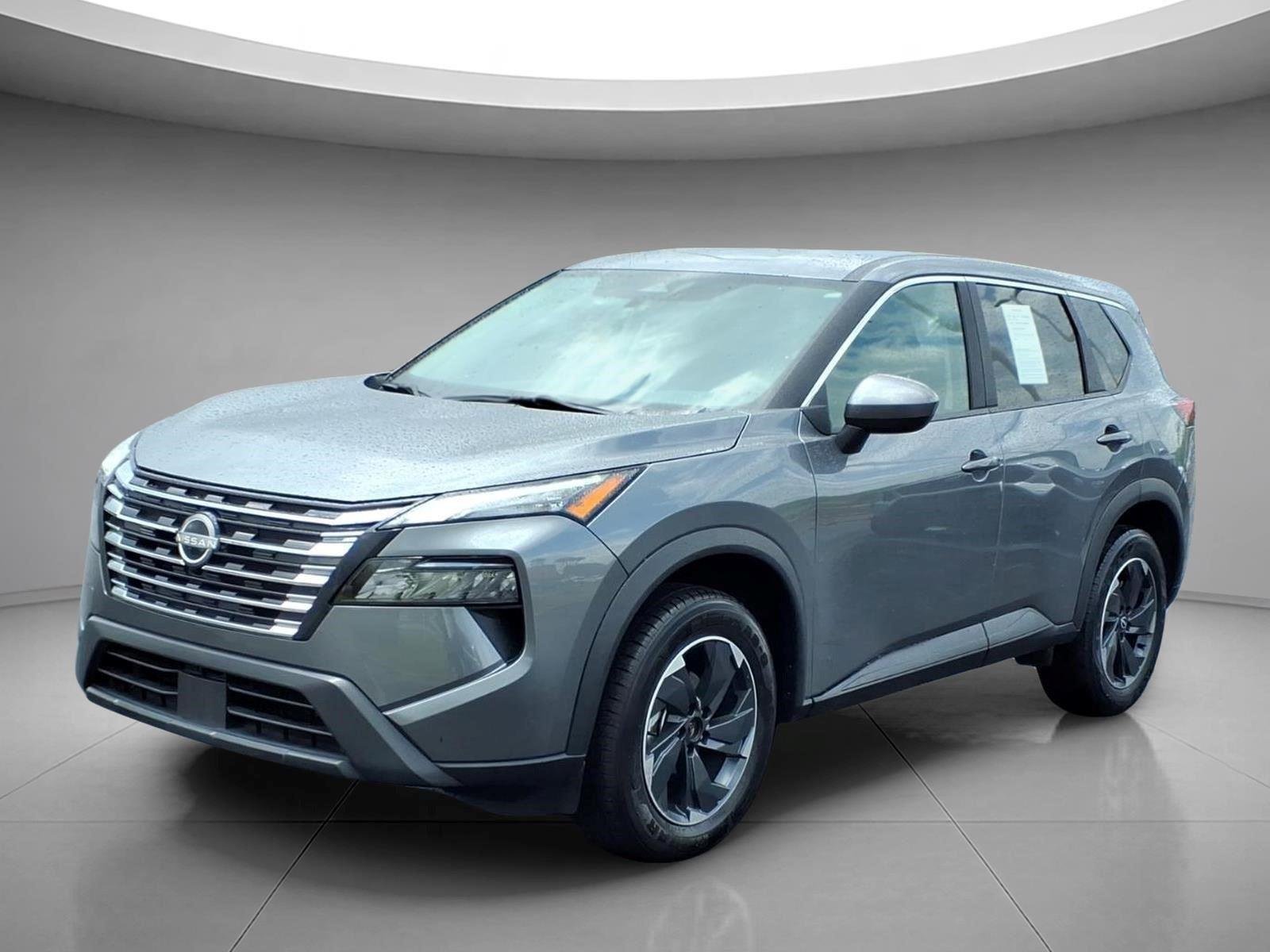 Used 2024 Gun Metallic Nissan SV image 1