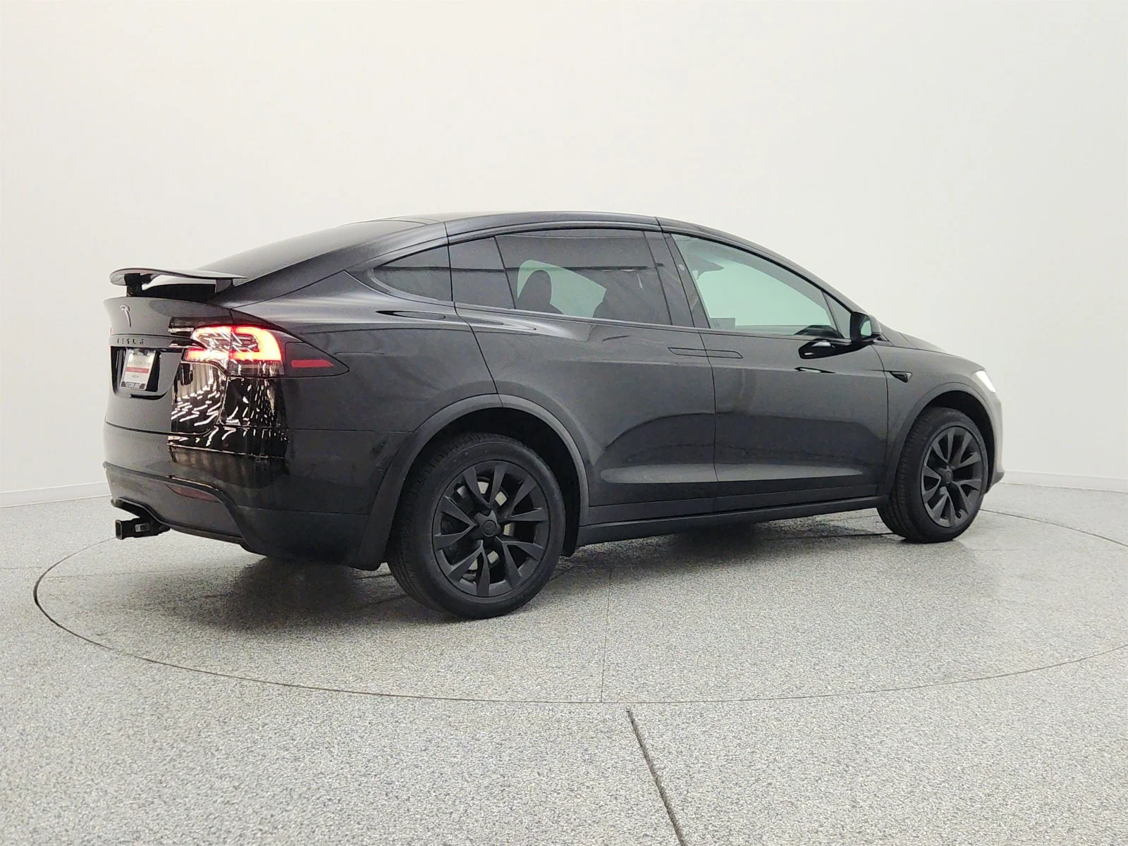 Used 2023 Solid Black Tesla AWD image 5