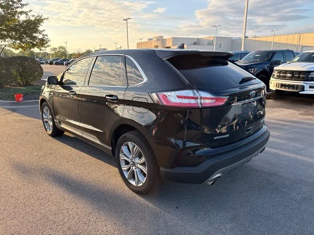 Used 2019 Agate Black Metallic Ford Titanium image 4