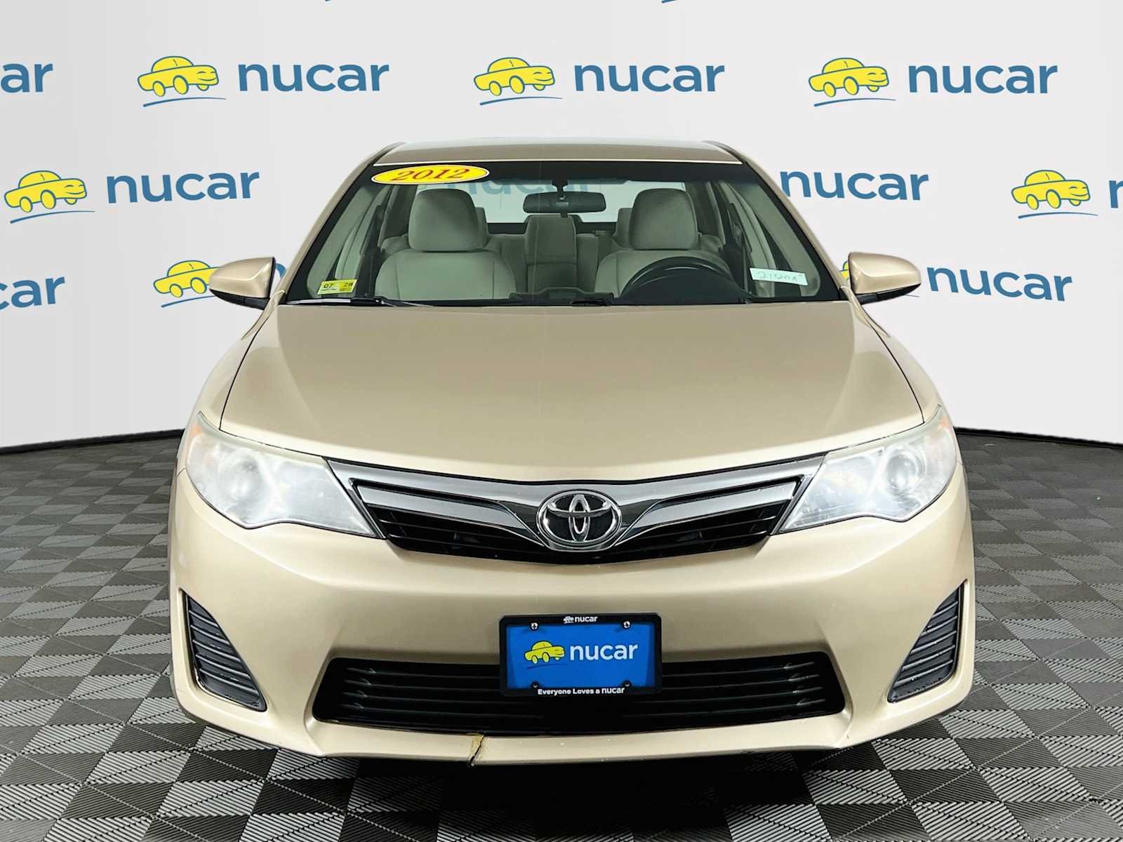 Used 2012 Sandy Beach Metallic Toyota LE image 2