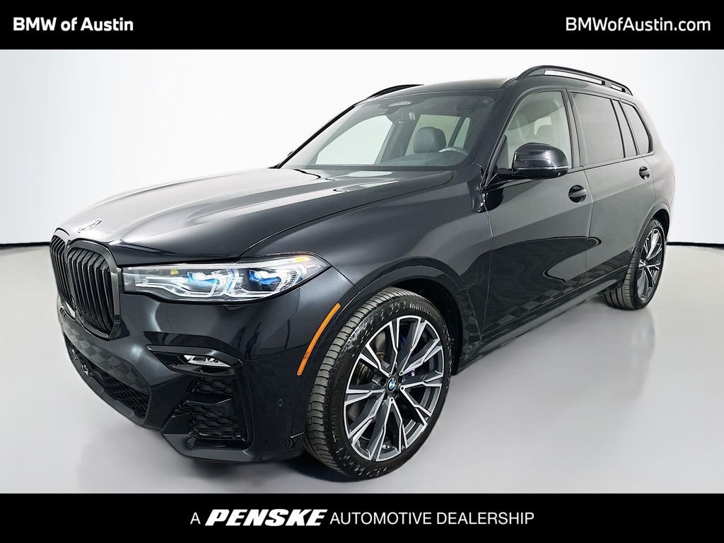Used 2022 Black Sapphire Metallic BMW M50i image 1