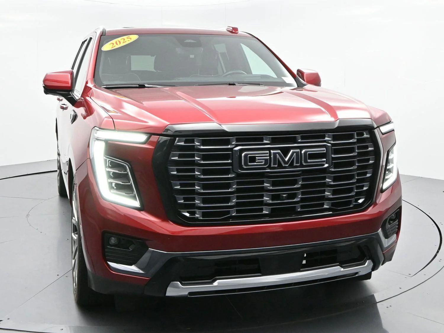 Used 2025 Volcanic Red Tintcoat GMC Denali Ultimate image 2