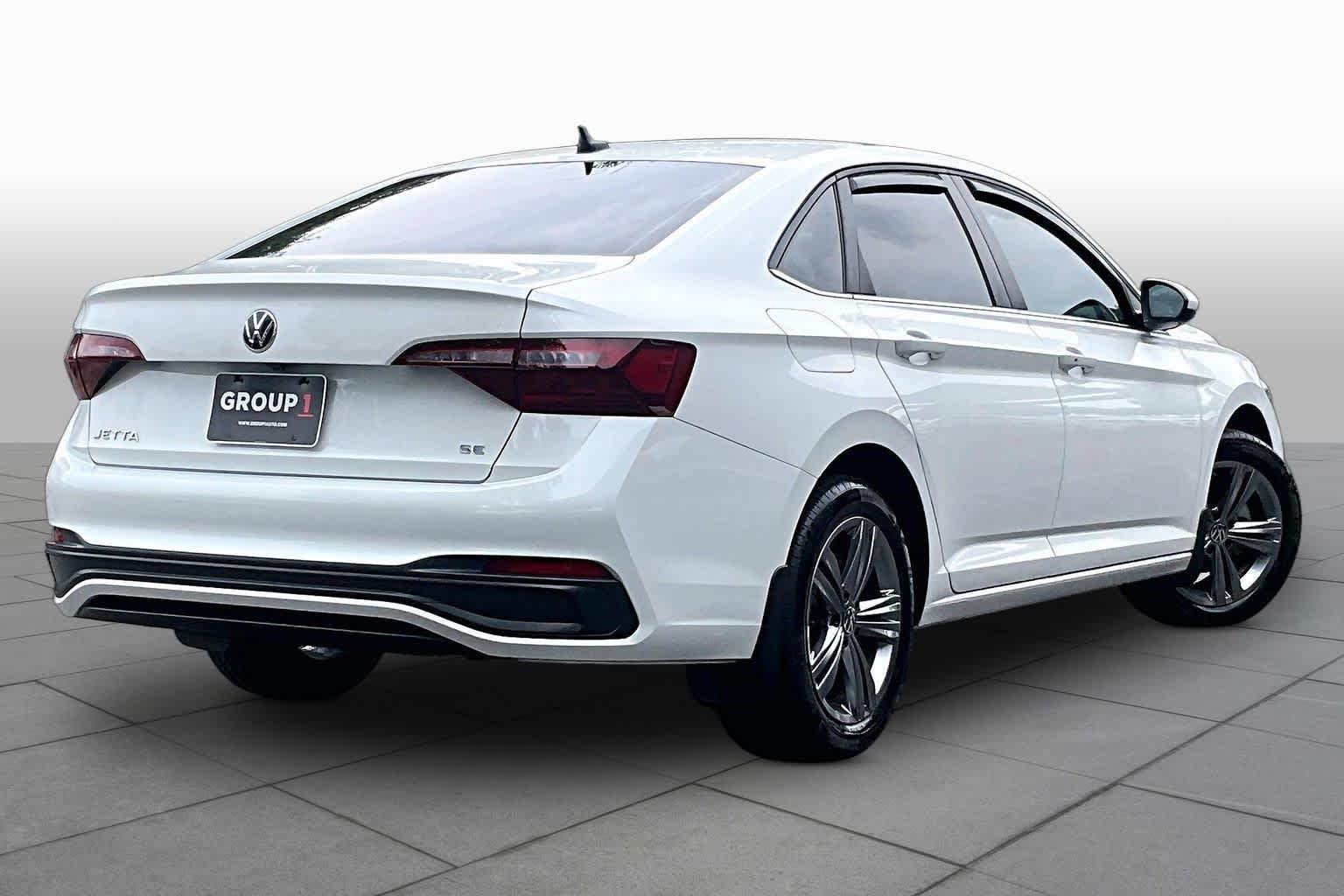 Used 2023 Opal White Pearl Volkswagen SE image 13