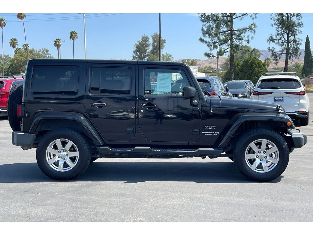 Used 2017 Black Clearcoat Jeep Sahara image 7