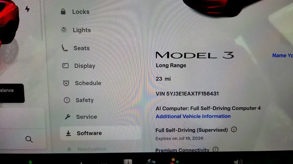 Used 2026 Ultra Red Tesla Long Range RWD w/ White & Black Premium Interior image 15
