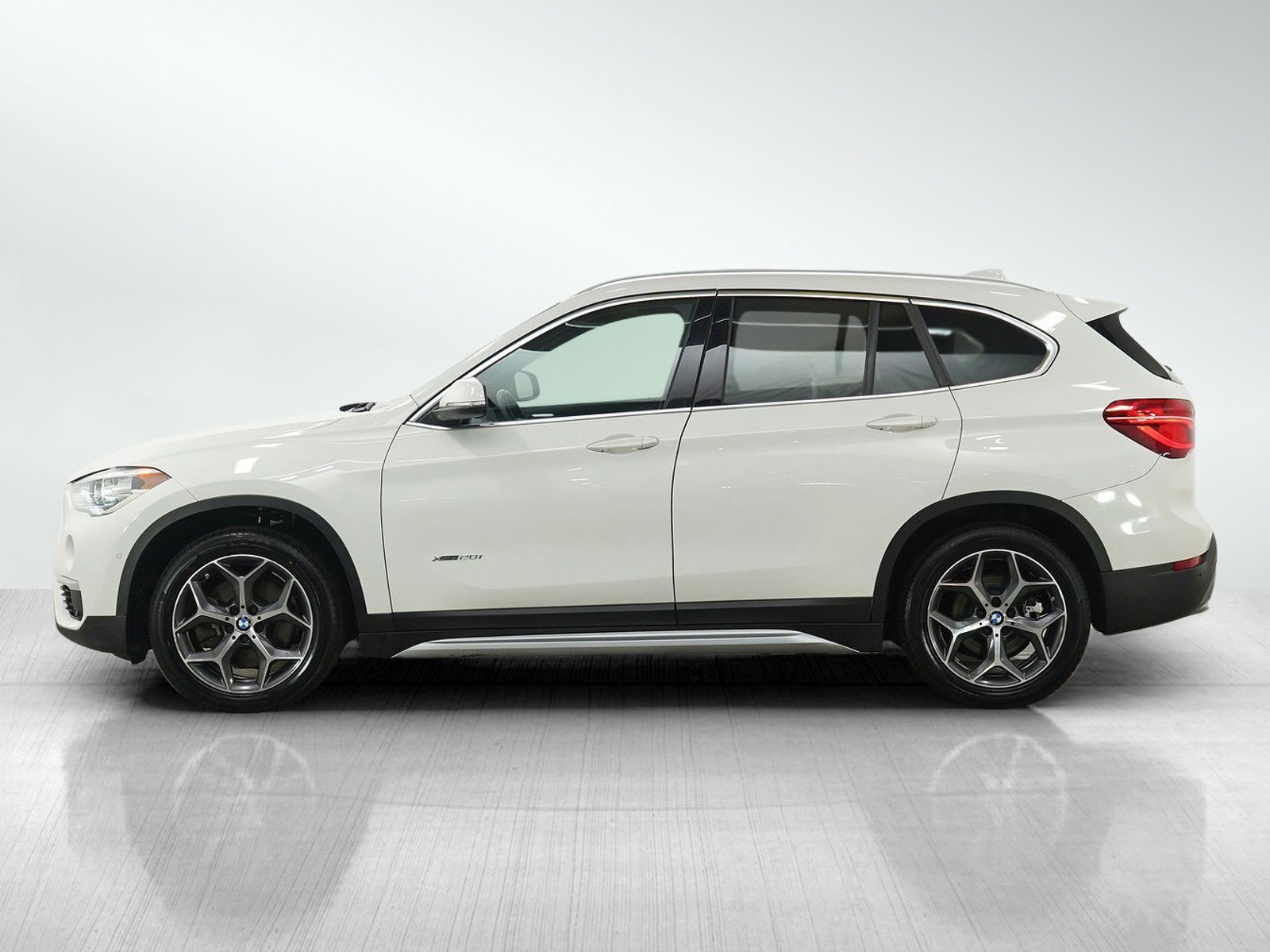 Used 2017 BMW X1 28i with VIN WBXHT3Z34H4A54906 for sale in White Bear Lake, Minnesota