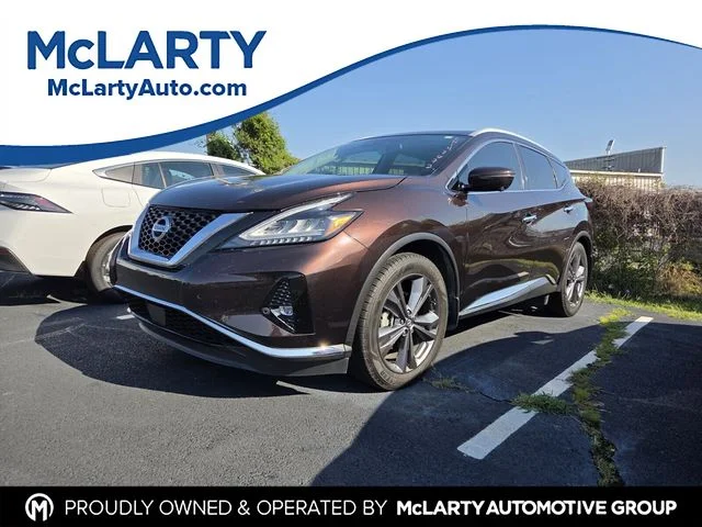 Used 2020 Brown Nissan Platinum image 1