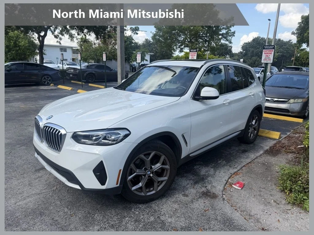 Used 2022 White BMW sDrive30i image 1