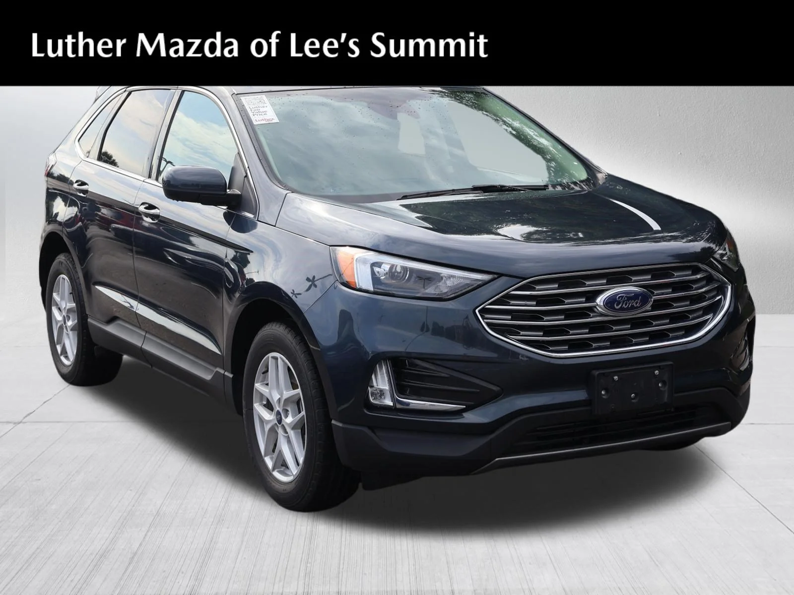 Used 2022 Stone Blue Metallic Ford SEL image 1