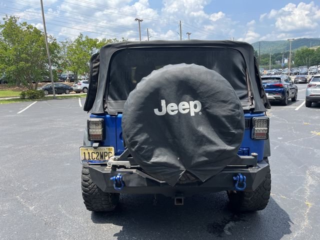 Used 2014 Flame Red Clearcoat Jeep Sport image 6
