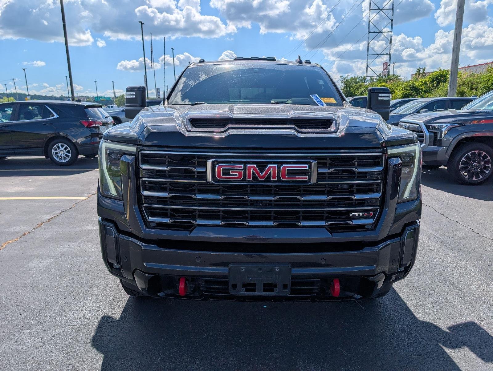 Used 2024 Titanium Rush Metallic GMC AT4 image 2