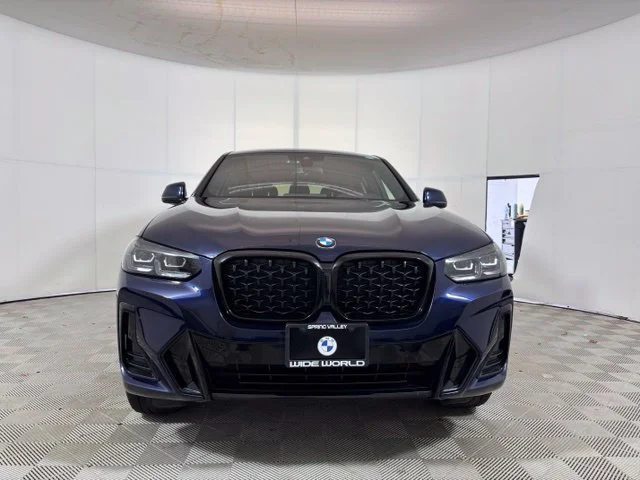 Used 2024 Tanzanite Blue II Metallic BMW xDrive30i image 2