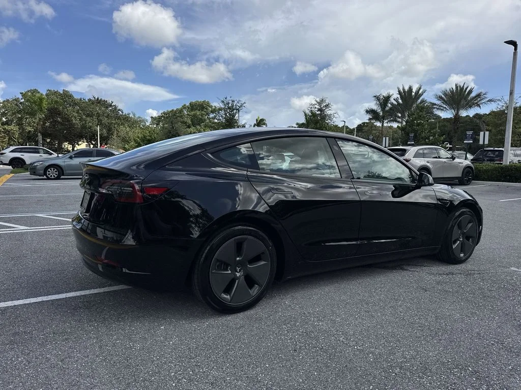 Used 2023 Solid Black Tesla  image 24