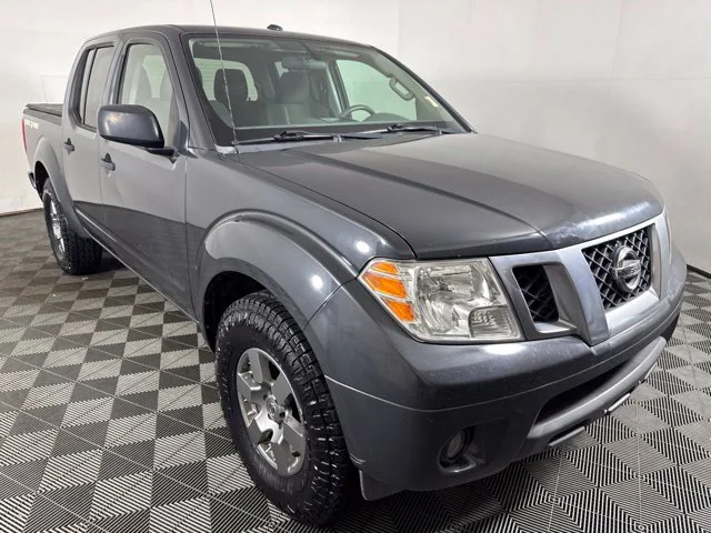 Used 2013 Black Nissan Desert Runner image 1