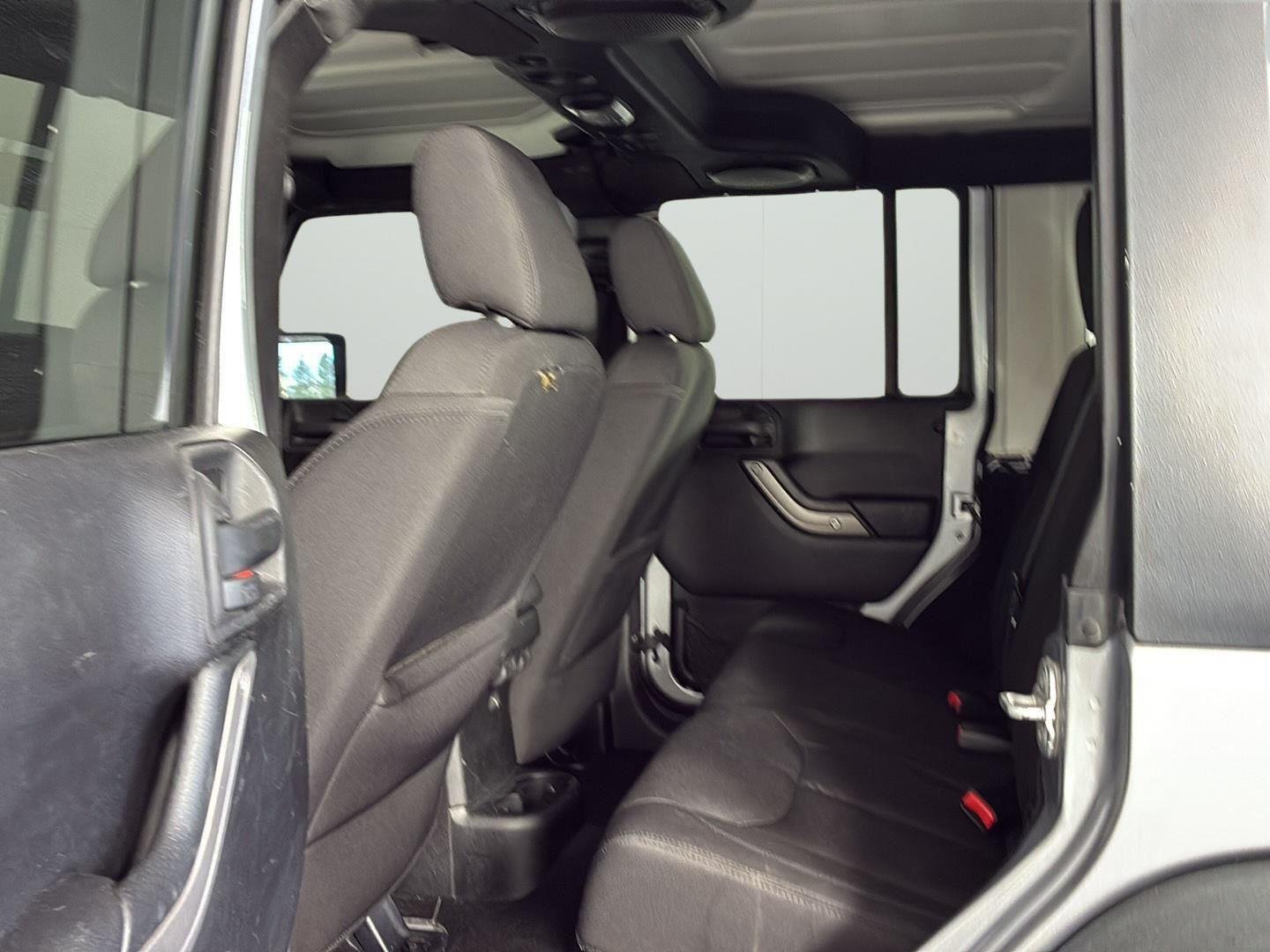 Used 2013 Billet Silver Metallic Jeep Sport image 20