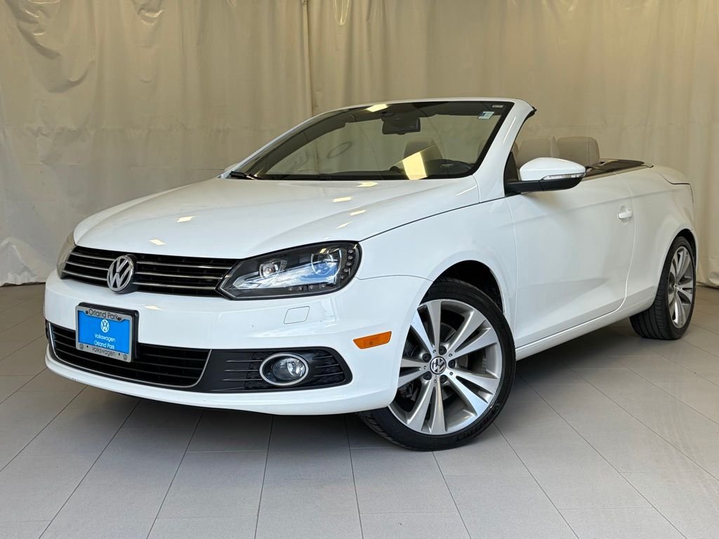 Used 2013 Candy White Volkswagen Lux image 1