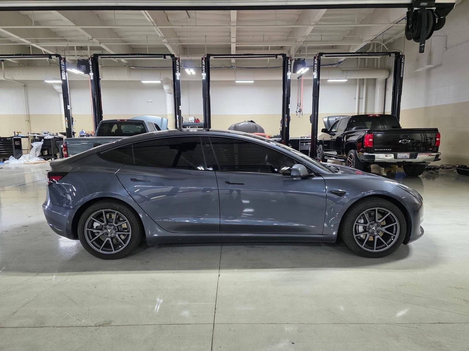 Used 2021 Solid Black Tesla Standard Range Plus image 8