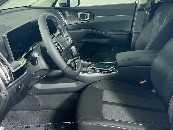 New 2026 Ivory Silver Kia LX image 12