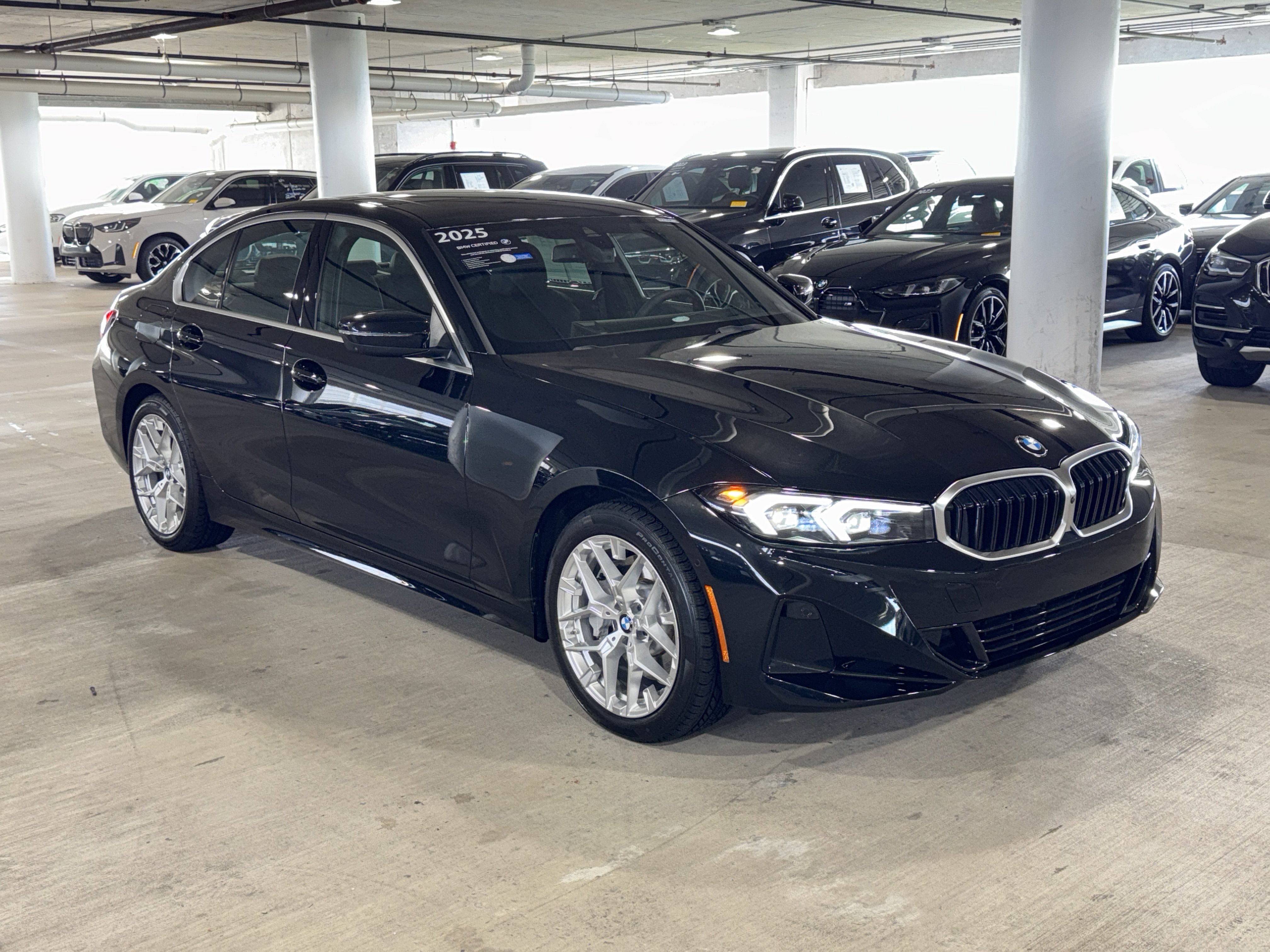 Used 2025 Black Sapphire Metallic BMW 330i image 2