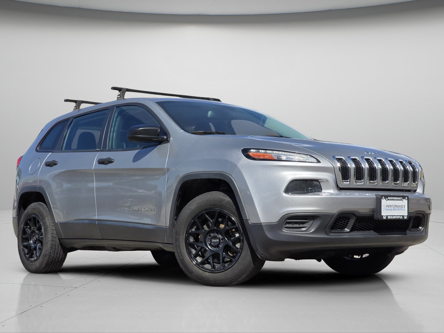 Used 2015 Billet Silver Metallic Clearcoat Jeep Sport image 2