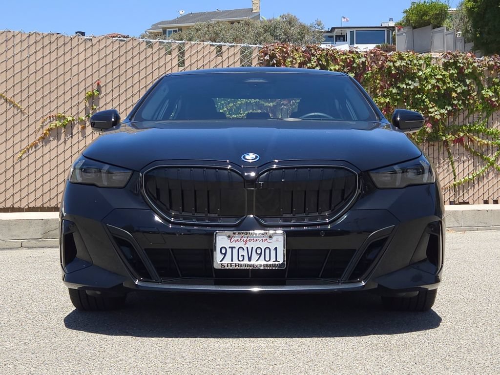Used 2026 Black Sapphire Metallic BMW 550e xDrive image 3