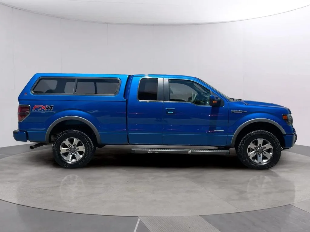 Used 2014 Blue Flame Metallic Ford FX4 image 6