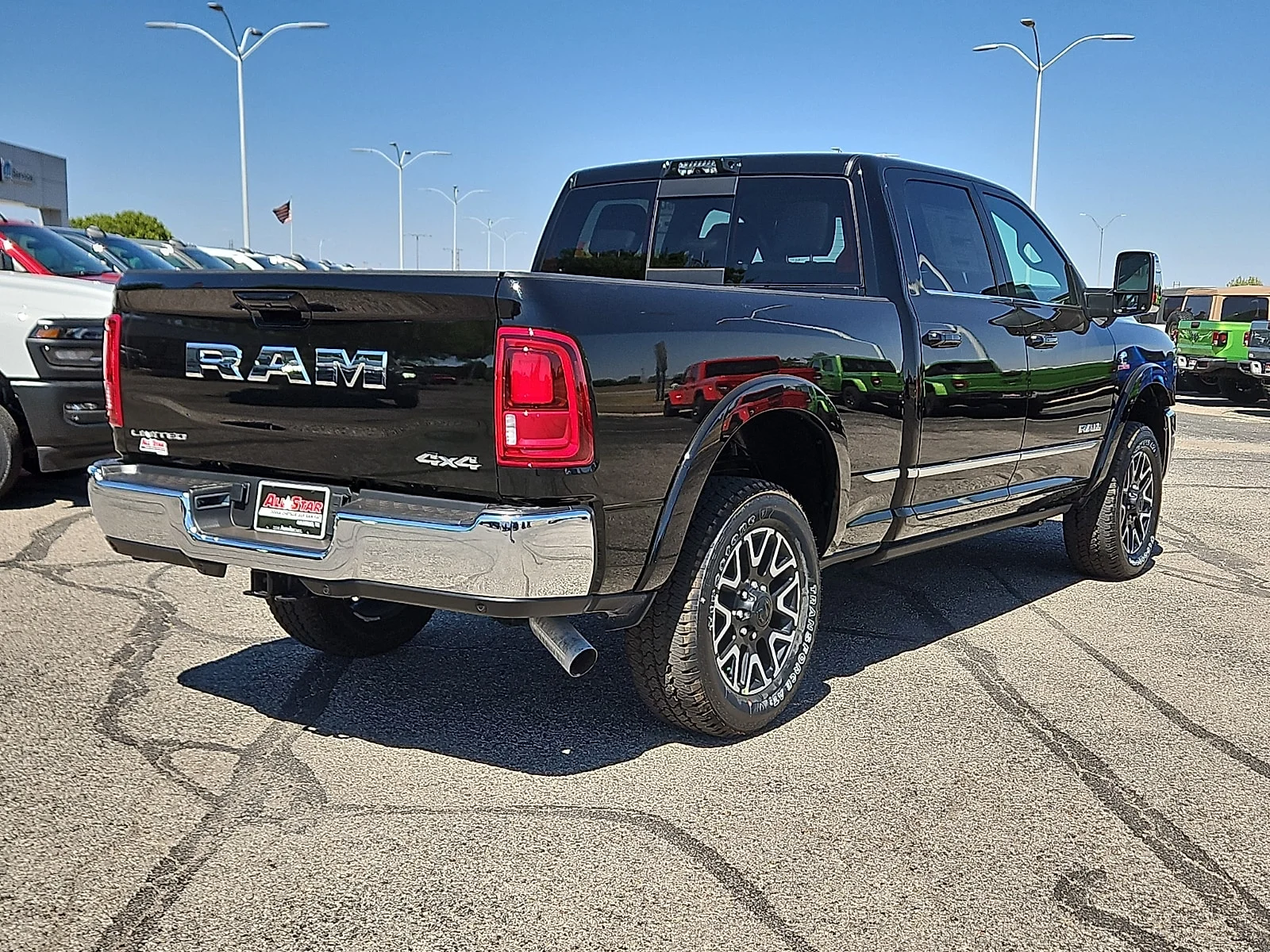 New 2026 Diamond Black Crystal Pearlcoat Ram LIMITED CREW CAB 4X4 6