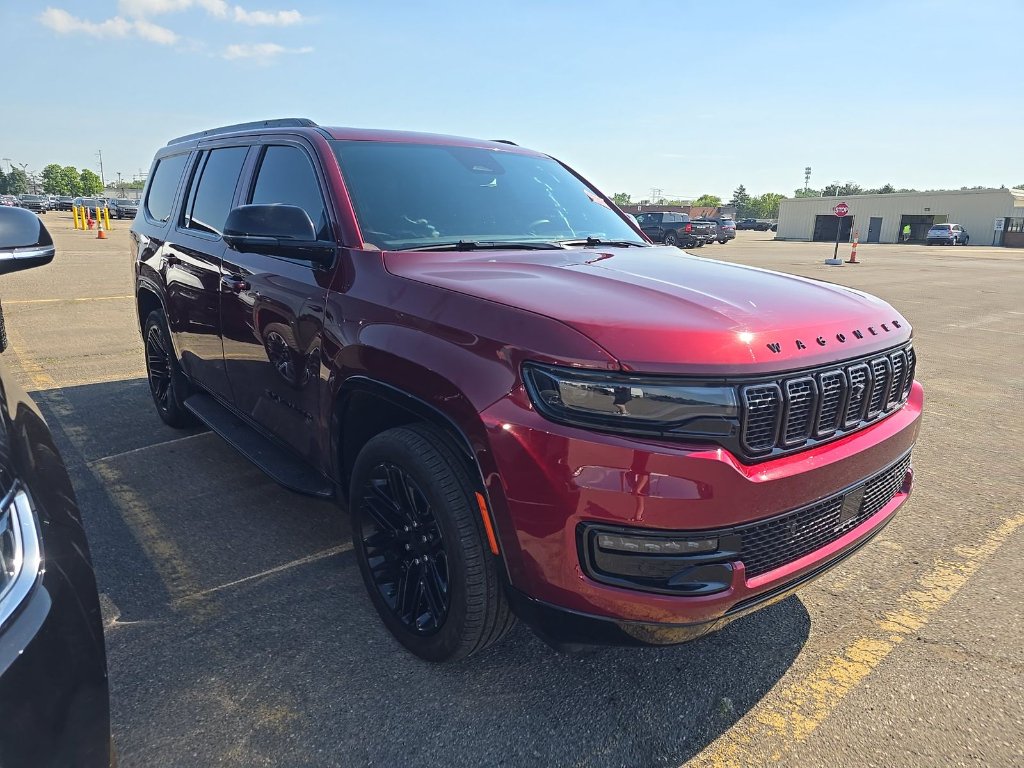 Used 2024 Velvet Red Pearlcoat Jeep Series II Carbide image 2