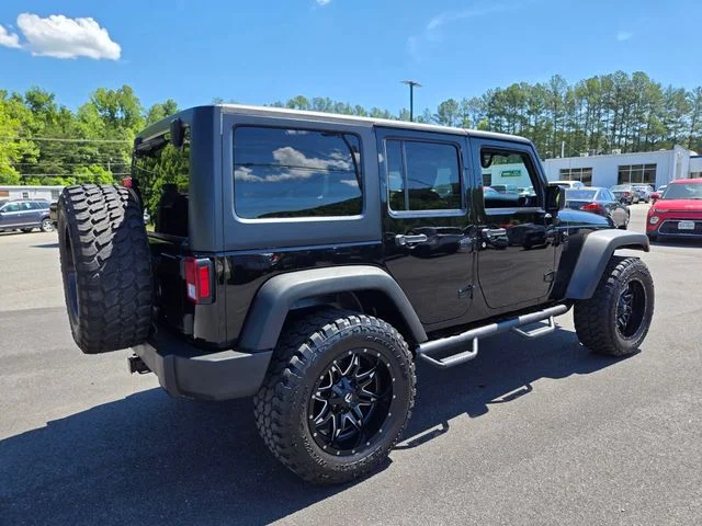 Used 2015 Black Jeep Unlimited Sport image 8