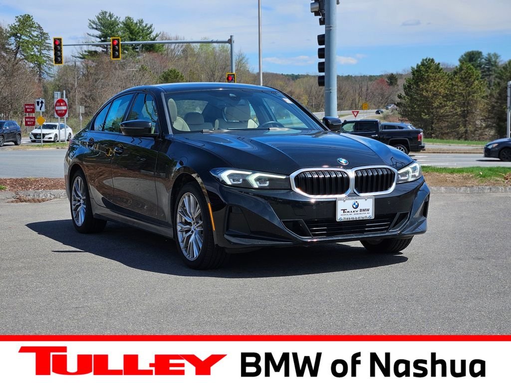 Used 2023 Jet Black BMW 330i xDrive image 1
