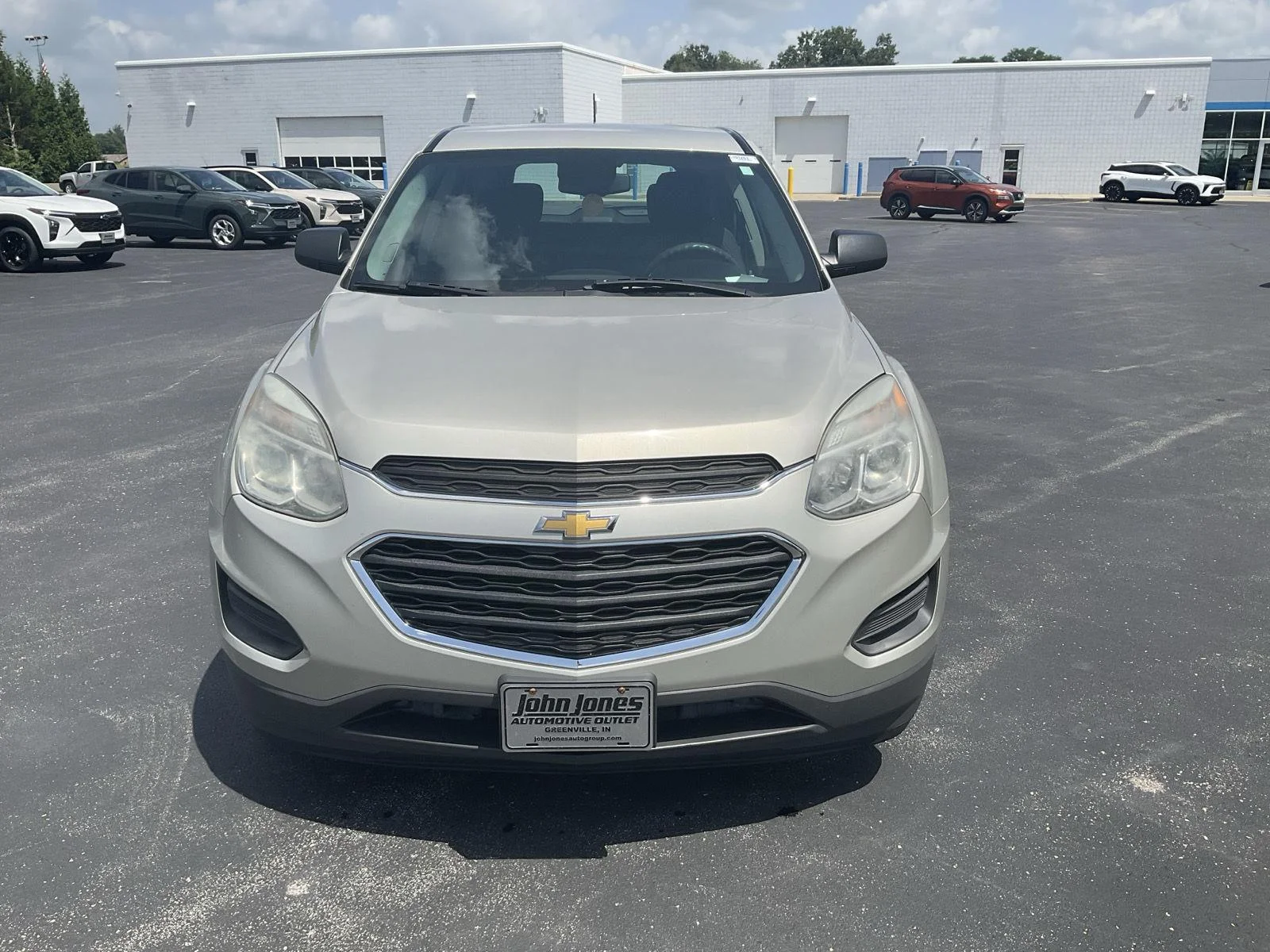 Used 2016 Champagne Silver Metallic Chevrolet LS image 2