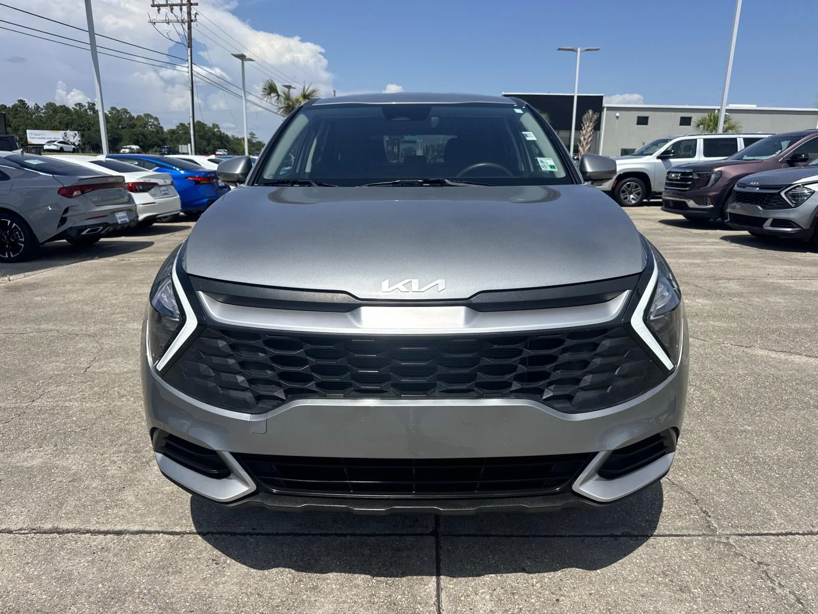 Certified Used 2023 Gray Kia LX AWD image 2