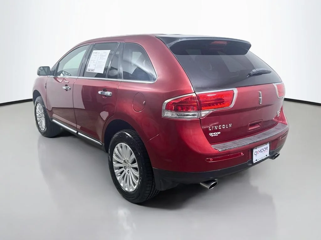 Used 2014 Ruby Red Metallic Tinted Clearcoat Lincoln Base image 5