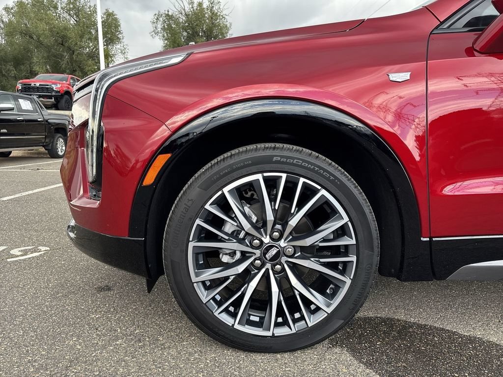 Used 2025 Radiant Red Tintcoat Cadillac Sport image 39