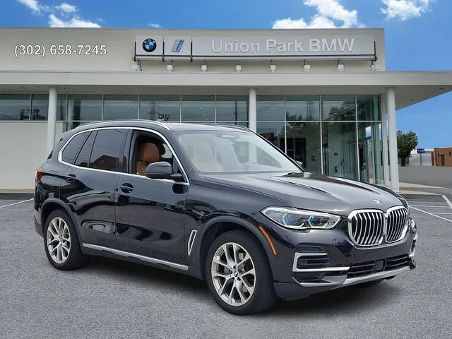 Certified Used 2023 Black Sapphire Metallic BMW xDrive40i image 3
