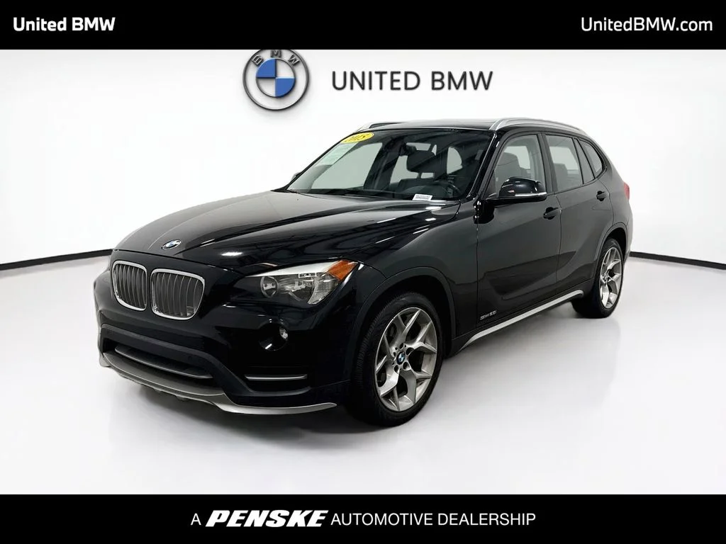 Used 2015 Black Sapphire Metallic BMW sDrive28i image 1