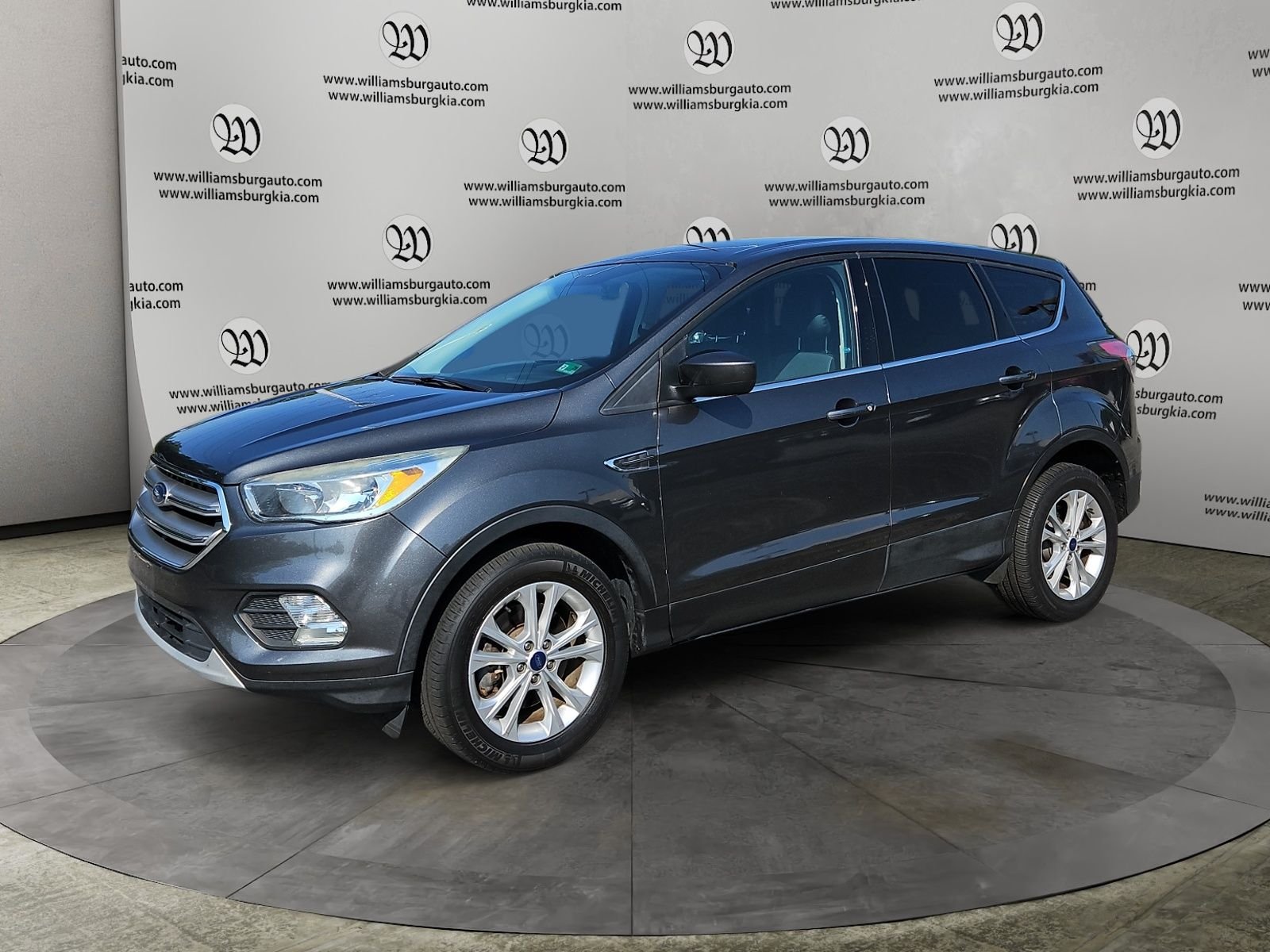 Used 2017 Gray Ford SE image 1