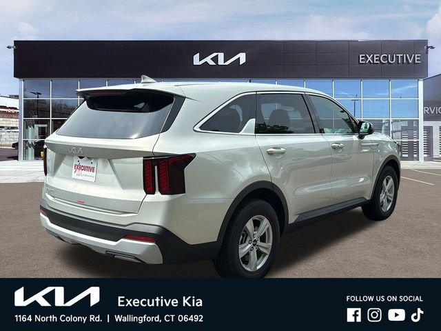 New 2026 Ivory Silver Kia LX image 4