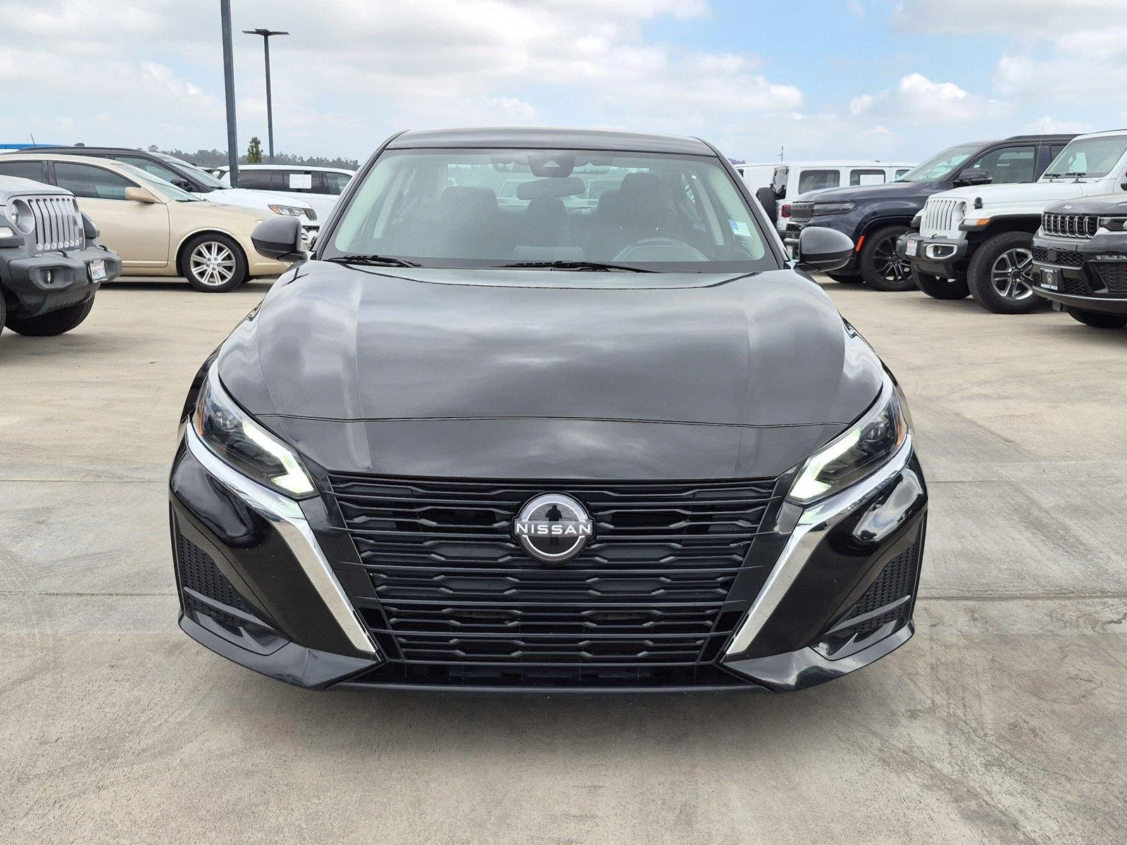 Used 2025 Super Black Nissan SV image 2