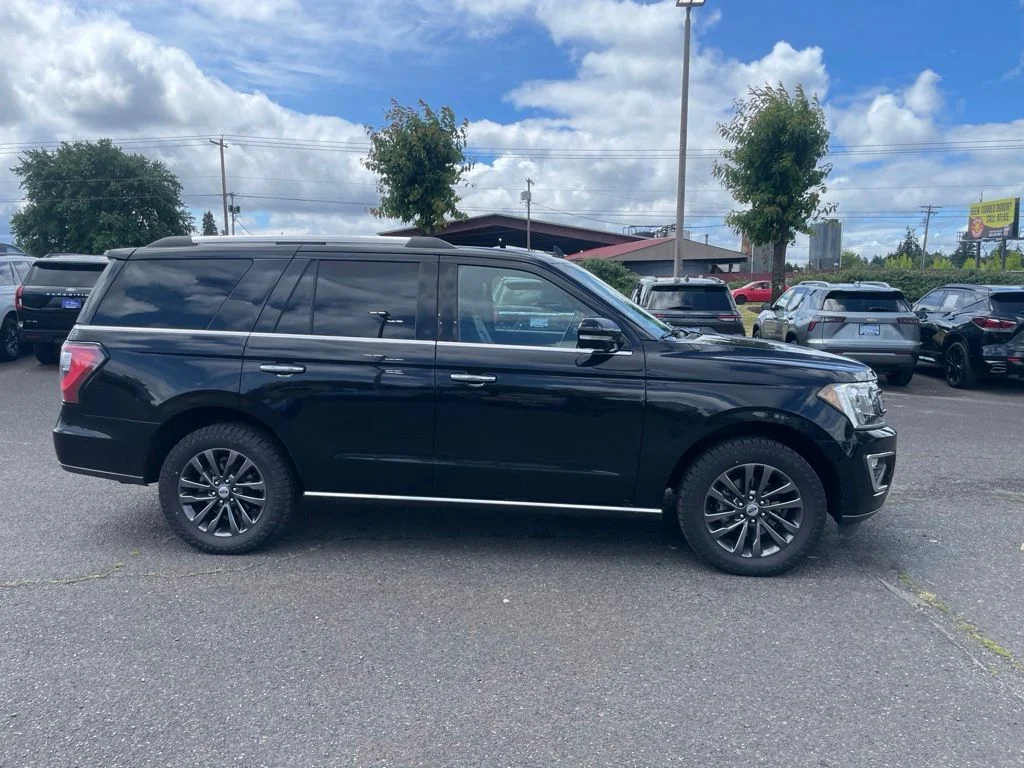Used 2021 Black Metallic Ford Limited image 4