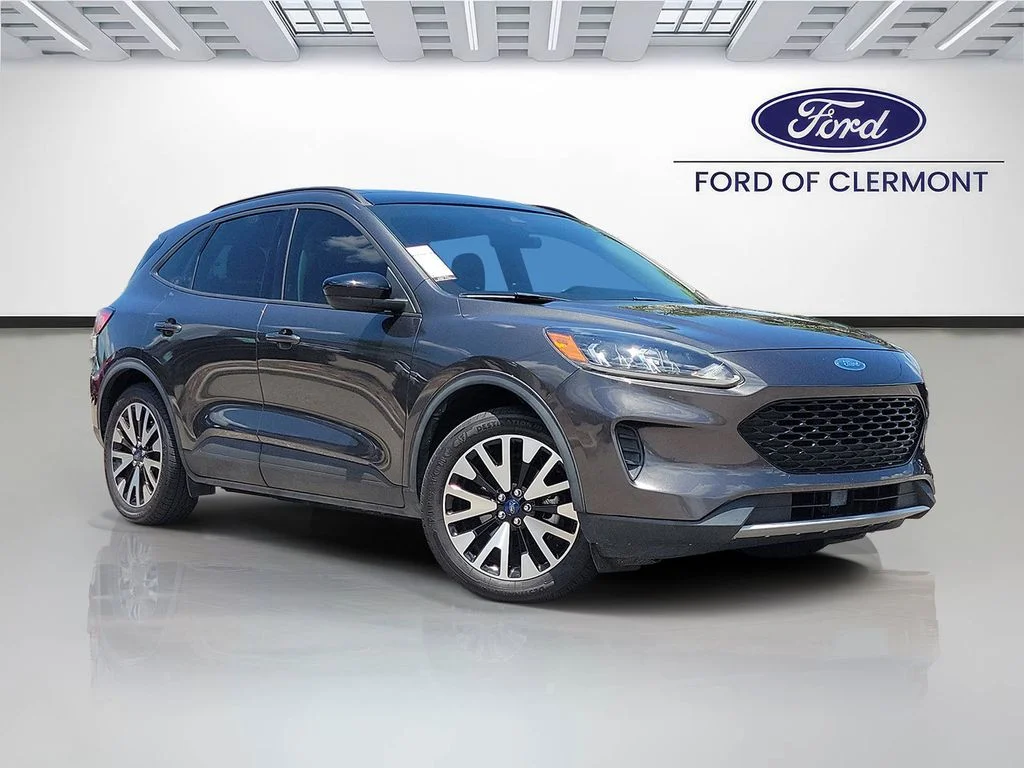 Used 2020 Magnetic Metallic Ford SE Sport image 1