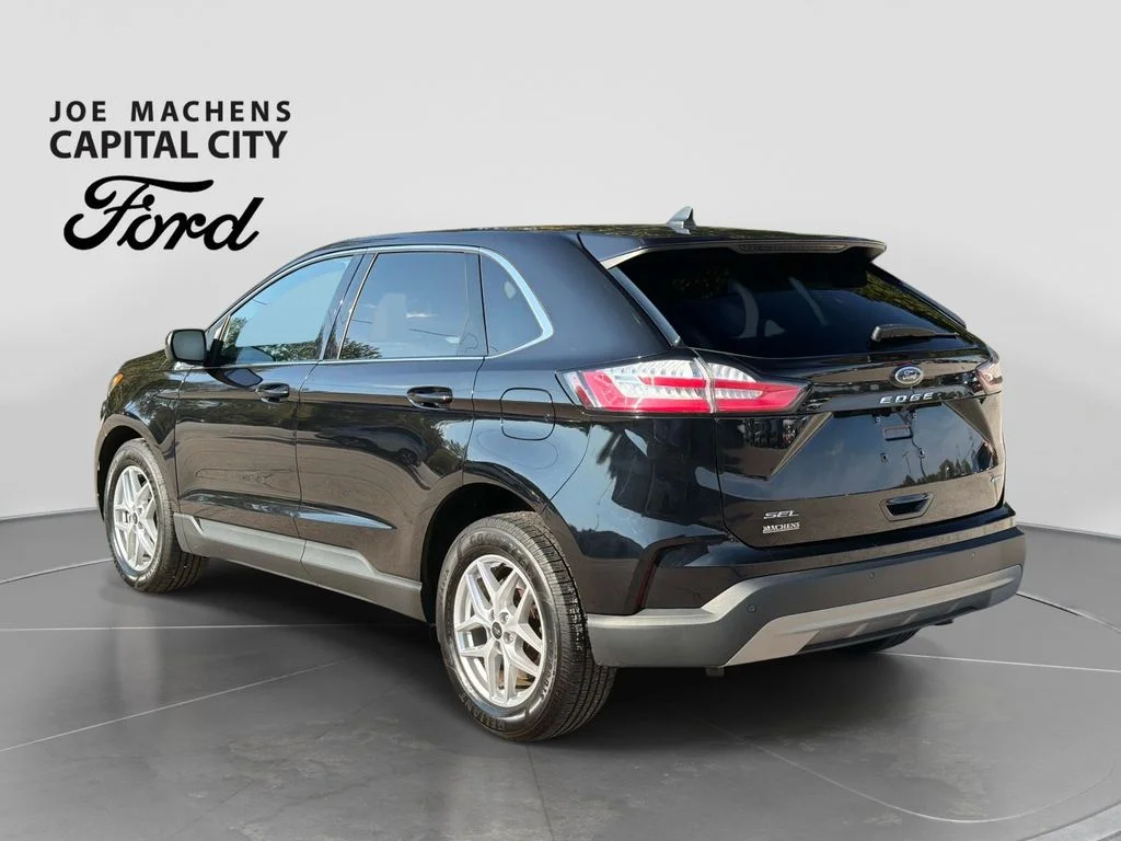 Used 2024 Agate Black Metallic Ford SEL image 7