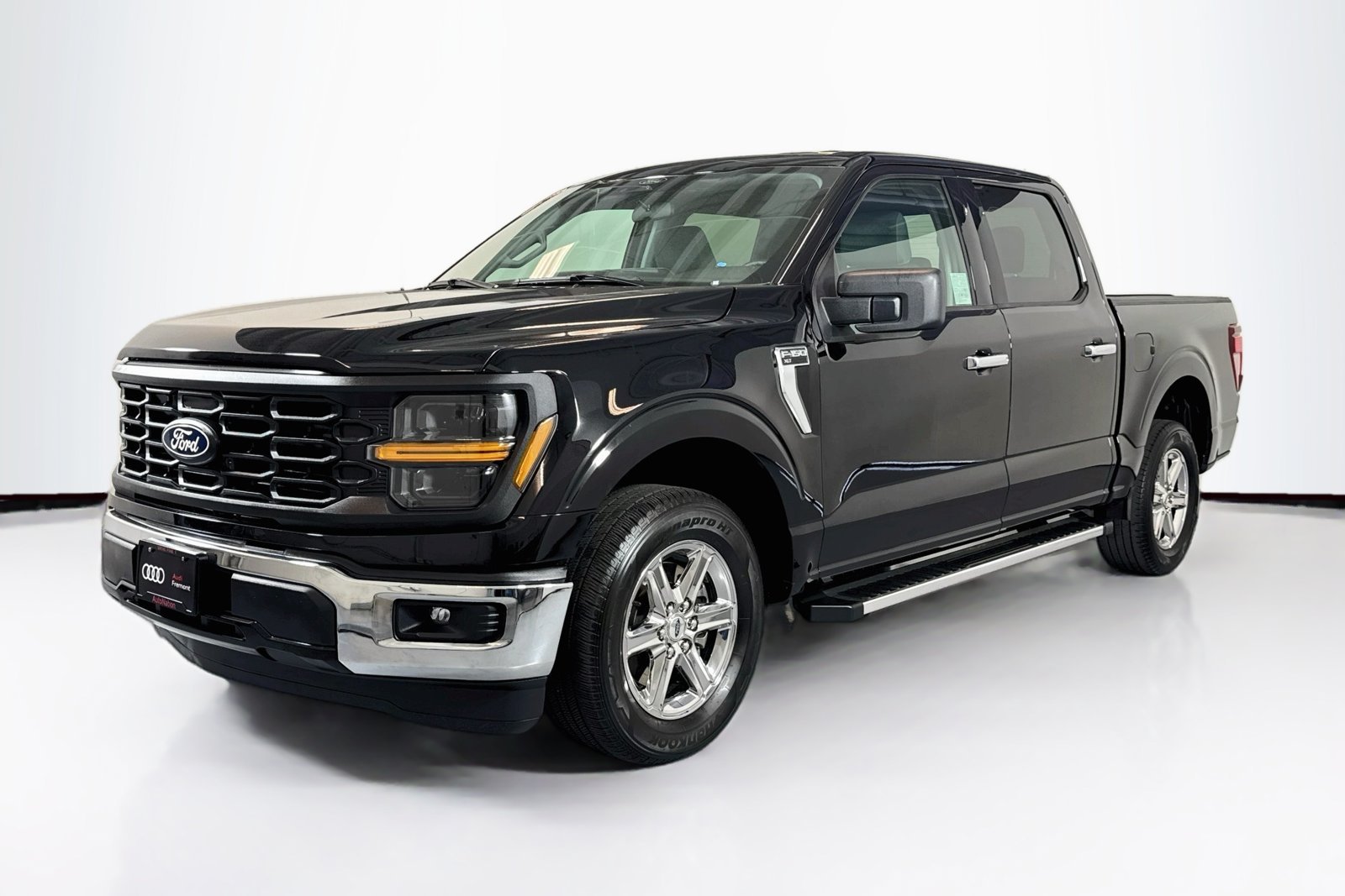 Used 2025 Agate Black Metallic Ford XLT image 1
