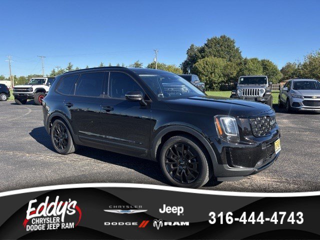 Used 2022 Black Copper Kia SX image 1
