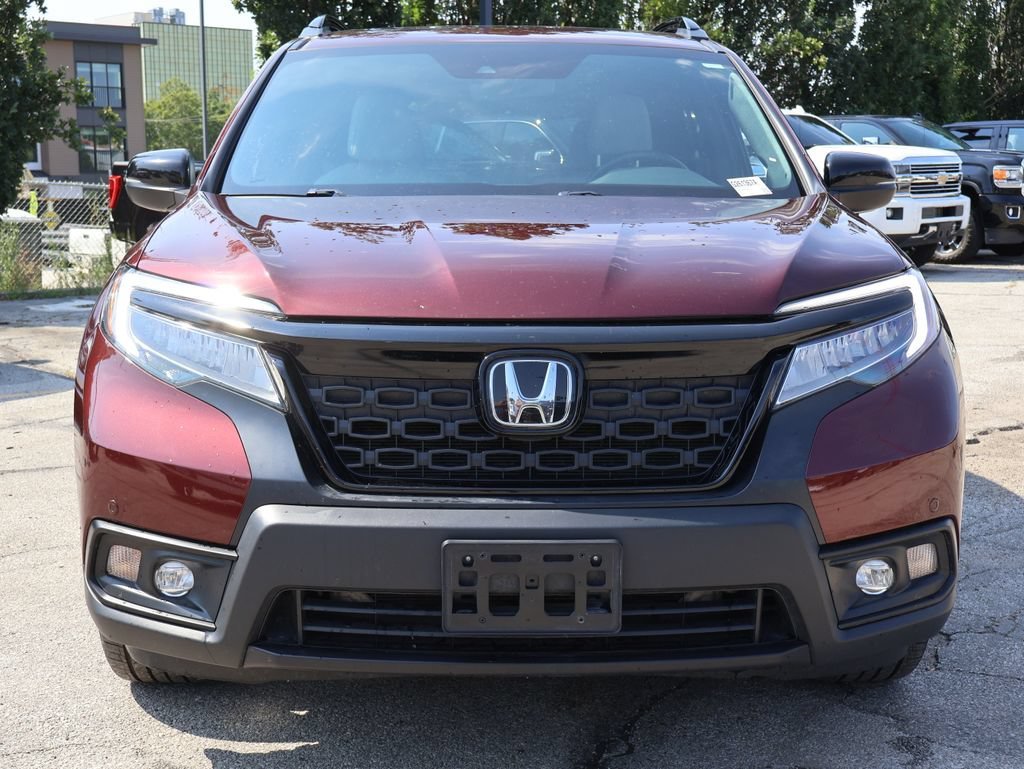 Used 2021 Honda Passport Touring with VIN 5FNYF8H94MB025039 for sale in Kansas City
