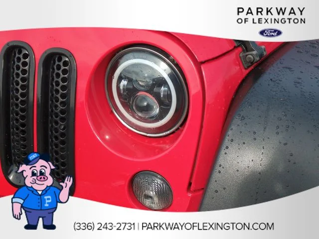 Used 2016 Red Jeep Unlimited Sport image 9